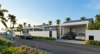 Hivery Pool Villa 2: Row of modern villas with carports, palm trees, and a road with flowering plants.