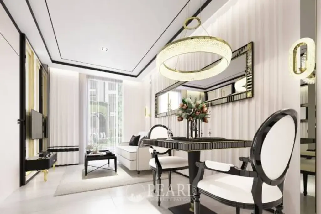 1 Bedroom Condo for Sale in The Embassy Jomtien living room with sofa and TV