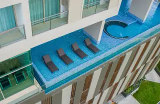 Marina Bayfront Sriracha aerial view of rooftop pool deck with sun loungers