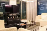 2 Bedroom Condo for Sale in Grand Solaire Pattaya dining area with table and chairs
