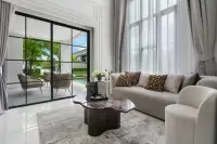 4 Bedroom House for Sale in The Palm Grandio's master bedroom with balcony access