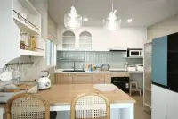 3 Bedroom House for Rent at Supalai Ville Pattaya - Motorway white kitchen with wood island pendant lights and blue tile backsplash