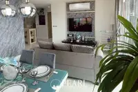 2 Bedroom Condo for Sale in Grande Caribbean second bedroom with twin beds and ample light