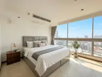 2 Bedroom Condo for Sale at Northshore Pattaya bright bedroom with city skyline view through large windows