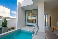 3 Bedroom House for Sale in Asaya Pool Villa modern kitchen with island