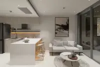 1 Bedroom Condo for Sale at Celine Wongamat modern open-plan living area with kitchen island, bar stools, grey sofa, and glass balcony door