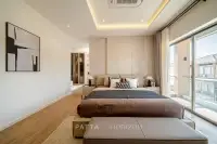 4 Bedroom House for Sale at Horizon By Patta spacious master bedroom with walk-in wardrobe, wood floors and balcony