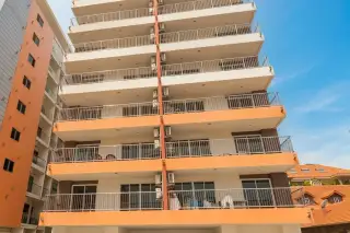 New Nordic Marcus 3 condo exterior with orange and white balconies overlooking Pattaya rooftops