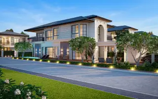 Rungsii Village modern two-story house exterior with private pool, lounge chairs, and manicured landscaping at dusk.