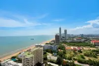 2 Bedroom Condo for Sale at Veranda Residence Pattaya master bedroom with king-size bed and sea view