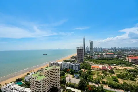 2 Bedroom Condo for Sale at Veranda Residence Pattaya master bedroom with king-size bed and sea view