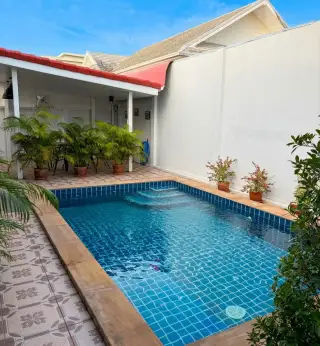 Siam Executive Estate private pool with tiled steps and covered lounge area