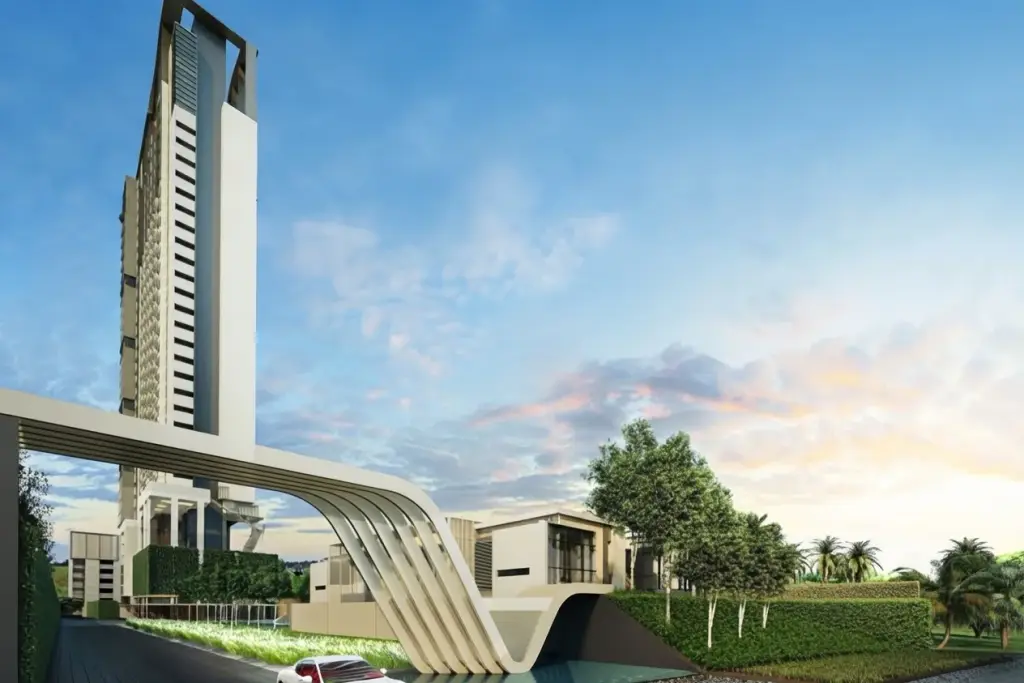 Veranda Residence Pattaya modern high-rise condo building with sleek entrance archway and landscaped greenery.