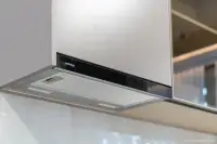1 Bedroom Condo for Sale at Aquarous Jomtien Pattaya close-up of Hafele stainless steel range hood under cabinet