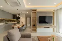 2 Bedroom Condo for Sale at Zensiri Estates and Residences open-plan living, dining, and kitchen area with cove ceiling lighting