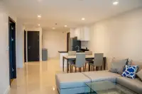 2 Bedroom Condo for Sale at The Elegance bright open-plan living, dining and kitchen area with white cabinetry