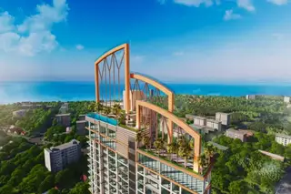 The Riviera Malibu rooftop with a swimming pool and unique architectural features, overlooking the ocean and city.