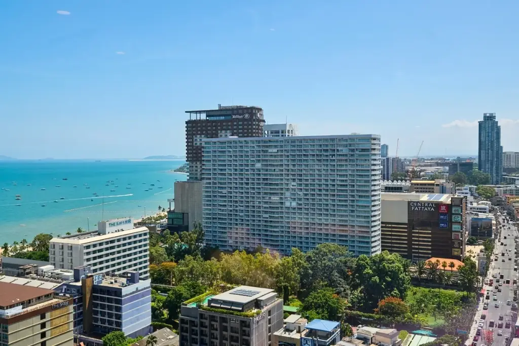 1 Bedroom Condo for Rent at EDGE Central Pattaya aerial view of building with sea and Central Pattaya mall in background