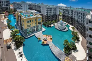 Arcadia Beach Continental: Aerial view of the large lagoon-style swimming pool with island buildings and surrounding condos.
