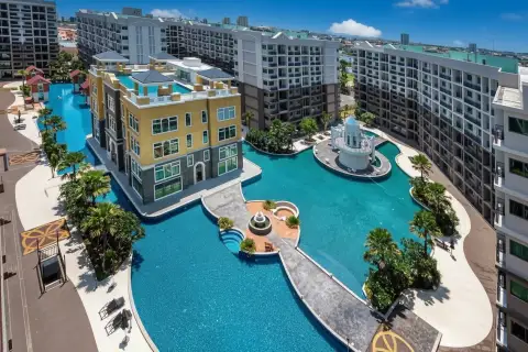 Arcadia Beach Continental: Aerial view of the large lagoon-style swimming pool with island buildings and surrounding condos.