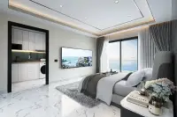 2 Bedroom Condo for Sale at Grand Solaire Noble bedroom with black marble headboard wall and mirrored closet