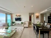 2 Bedroom Condo for Sale at Riviera Monaco open-plan living and dining area with sea-view balcony