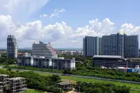 1 Bedroom Condo for Sale at Cetus Beachfront elevated city view showing Pattaya residential towers and lush greenery