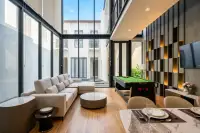 4 Bedroom House for Sale at Inara Villa elegant master bedroom with king-size bed