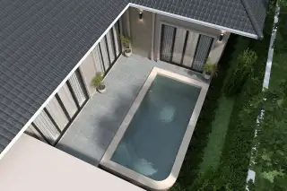 Living 19 At Santisuk aerial view of private rectangular swimming pool with stone tile deck and potted trees