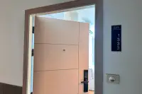 1 Bedroom Condo for Sale at The Twin Tower Jomtien Beach Pattaya unit 1333 wooden front door with smart digital lock