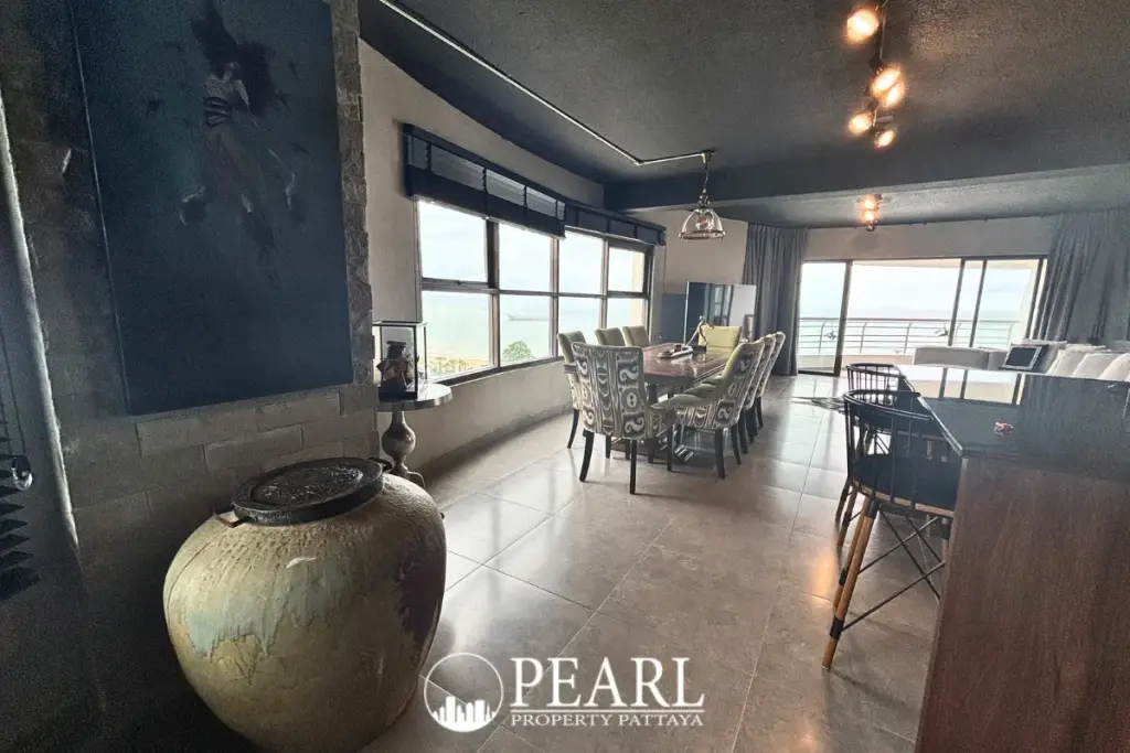 1 Bedroom Condo for Sale in Metro Jomtien Condotel living room with sofa and TV