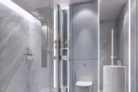 Studio Condo for Sale at Embassy World modern bathroom with marble walls, rainfall shower panel, smart mirror, and wall-hung toilet