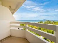 Studio Condo for Sale at Jomtien Condotel & Village private balcony with sea view and greenery below