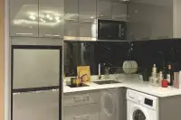 1 Bedroom Condo for Sale at Pristine Park 3, contemporary bathroom with vanity, toilet, and glass-enclosed shower.