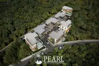 5 Bedroom House for Sale in The Ozone Wealth Jomtien Pool Villa Pattaya exterior view with garden