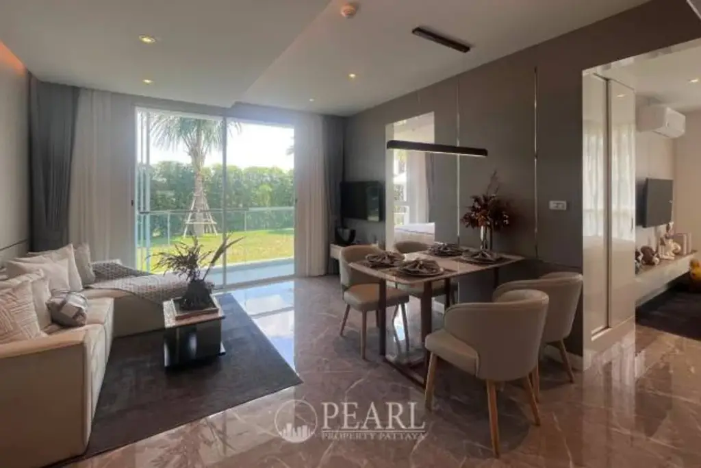 2 Bedroom Condo for Sale in The Coral Pattaya spacious living room with modern furniture