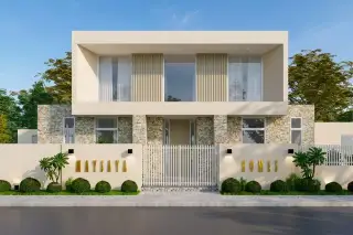 Maysaya Home, modern two-story house facade with stone cladding, white fence, and landscaped garden at dusk.