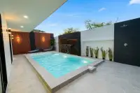 5 Bedroom House for Rent at View Point Village private pool with waterfall feature and lounge chairs