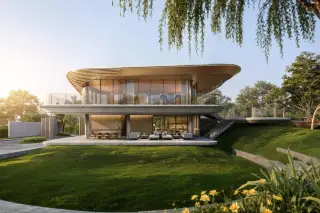 Solava Pattaya modern two-storey house exterior with curved floating roof glass facades and manicured garden lawn