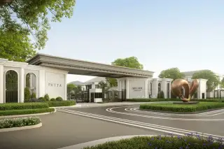 Arcade modern two-story house with a three-car garage, main entrance, and outdoor seating area.