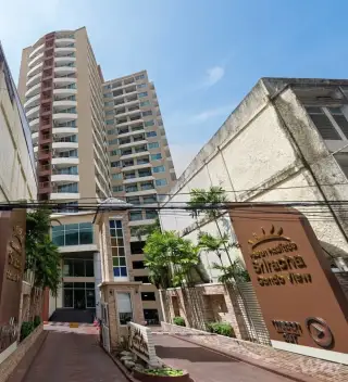 Sriracha Condo View building signage and glass lobby entrance with twin residential towers