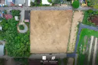 Land for Sale at Bliss Jomtien top-down aerial view of flat rectangular cleared land plot with surrounding roads