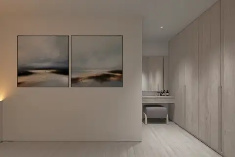 2 Bedroom Condo for Sale at Celine Wongamat walk-in wardrobe area with wood cabinets, vanity dressing table, and abstract wall art