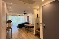 4 Bedroom Condo for Sale at Cetus Beachfront open-plan interior view from entrance door toward living area and balcony