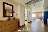 2 Bedroom Condo for Sale in Zire Wongamat open-plan kitchen with appliances
