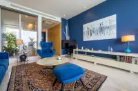 3 Bedroom Condo for Sale in The Cove Pattaya dining area with stylish furniture