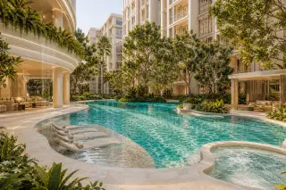 Love It Wongamat Beach lagoon-style pool with in-water sun loungers jacuzzi and tropical courtyard garden