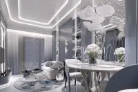 Studio Condo for Sale at Embassy World open-plan living and dining area with crystal chandelier, round dining table, and LED star ceiling