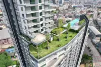 1 Bedroom Condo for Sale in Arcadia Millennium Tower bedroom with king-size bed