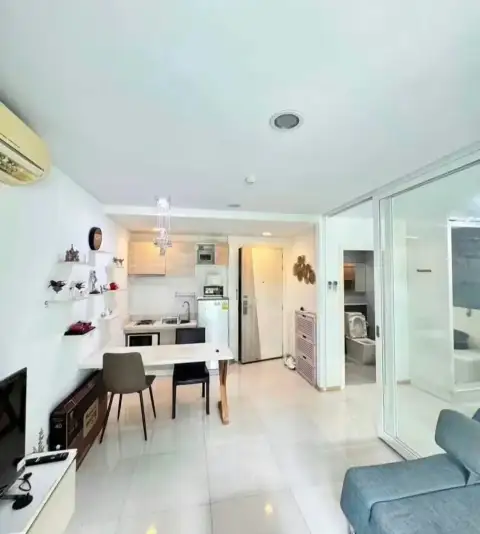 1 Bedroom Condo for Rent at Acqua Condo open-plan kitchen with dining table and entryway